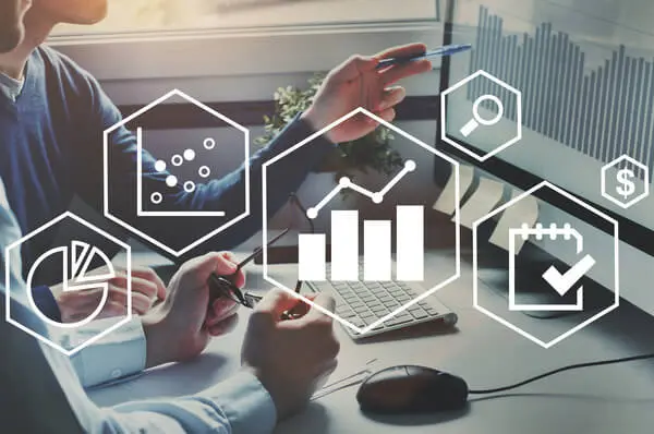 Business Intelligence People Pointing At Chart